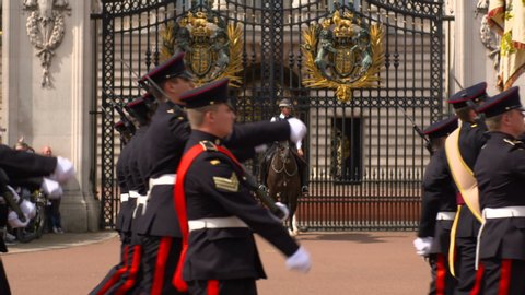 LONDON, ENGLAND, August 5th 2019: Changing the Guard at Buckingham Palace London. The Queen's Guard in London changes in the forecourt of Buckingham Palace at 11:00 am every day in early summer.