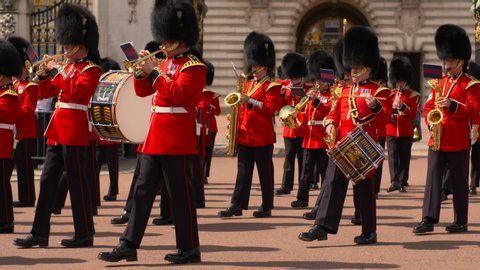 LONDON, ENGLAND, August 5th 2019: Changing the Guard at Buckingham Palace London. The Queen's Guard in London changes in the forecourt of Buckingham Palace at 11:00 am every day in early summer.