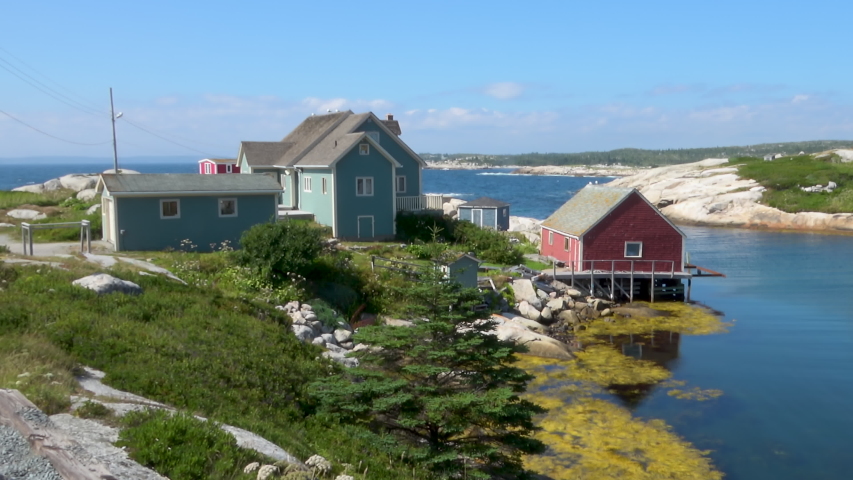 4K Pan & Zoom Travel Fisherman Houses In Cove	