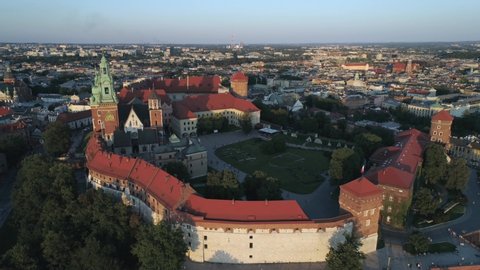 Aerial view. Wawel Castle in the historic center of Krakow, Poland. Sunset. 4K