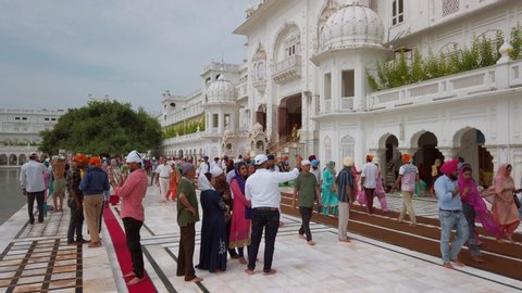 Amritsar, India - Circa October 2019. Devotees visiting Golden temple in Amritsar.
