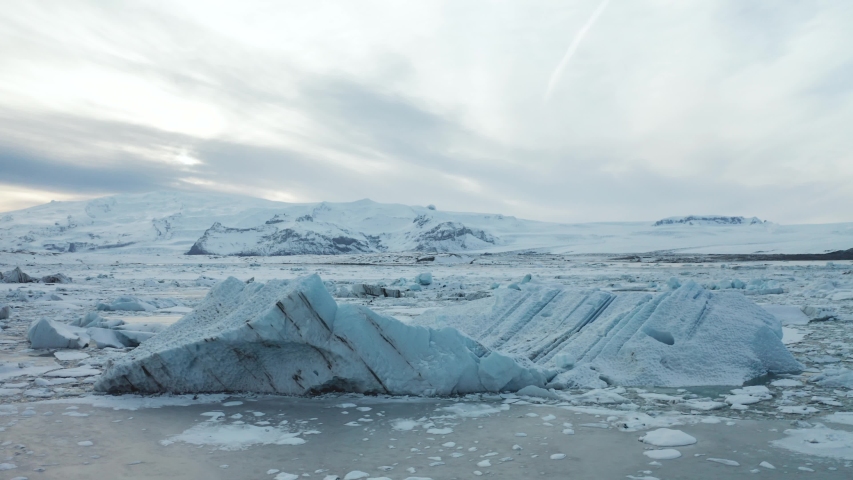Aerial view of the J kuls rl n glacial lagoon and floating icebergs. The beginning of spring in Iceland