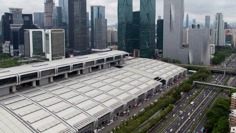 Shenzhen central business district aerial skyline panorama timelapse pan up