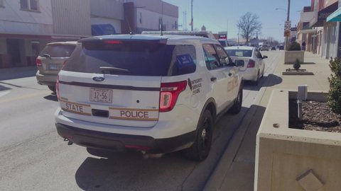 Salem , Illinois / United States - 03 16 2019: ILLINOIS STATE TROOPER SITS AT A TRAFFIC STOP 3-16-2019