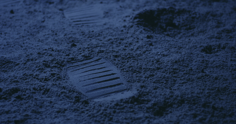 Close-up of astronauts footprint on planets surface Royalty-Free Stock Footage #1041809965
