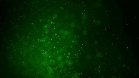 Green Sparkling Merry Christmas Happy New Year 4K Loop features glitter swirling around in a green atmosphere with an animated Merry Christmas Happy New Year text in a loop