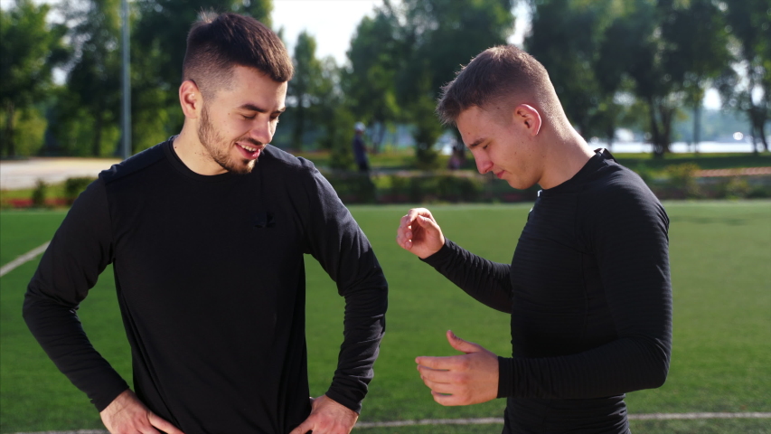 Two fighters practice mma skills in training