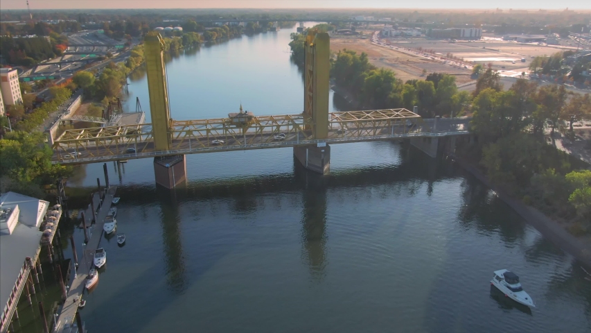 Aerial flying over Sacramento Tower Bridge, sacramento river & the city skyline. Sacramento, California, USA. 9 November 2019