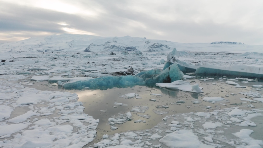Aerial view of the J kuls rl n glacial lagoon and floating icebergs. The beginning of spring in Iceland
