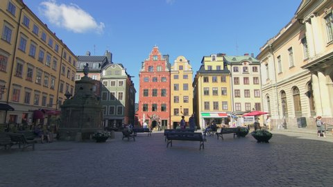 STOCKHOLM, SWEDEN - CIRCA 2019:  The Stortorget square, one of the most visited and most vibrant places in Stockholm. Traditional narrow houses with colorful facades.
