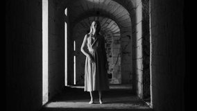  Dancing blonde woman in  dress in an old abandoned building Black and white video. Contact improvisation, contemporary
