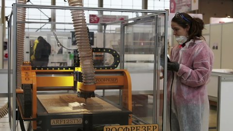Moscow,Russia-28 Nov 2019: Education and career Young Professionals 2019 (WorldSkills Russia). Work of participants on milling machine and woodworking
