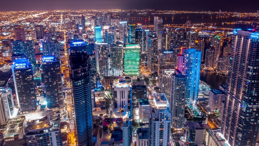 Miami downtown timelapse hyperlapse. Beautiful aerial shot of Miami city. Drone flying over a city night lights Miami in 4K