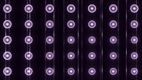 Disco spectrum lights concert spot bulb. Abstract motion background in violet colors, shining lights on black background. Creative bright flood lights flashing. UHD 4k 4096.  Seamless loop. 