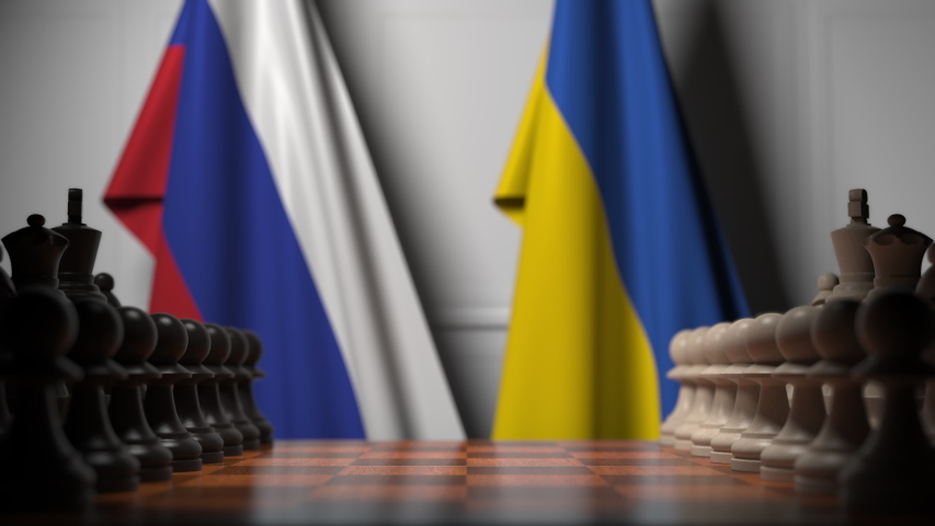 Flags of Russia and Ukraine behind pawns on the chessboard. Chess game or political rivalry related 3D animation Royalty-Free Stock Footage #1041931027