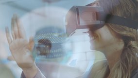 Animation of young woman in VR headset using virtual screen in an engineering office - Powered by Shutterstock - Get 15% off with code: PIKWIZARD15