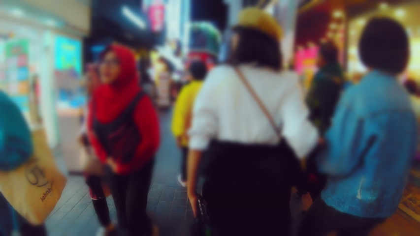 Scene time lapse of people crowded in Myeongdong Street Market at south Korea