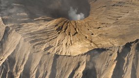 Aerial view the crater of the famous active Bromo volcano or Mount Gunung Bromo inside the Tengger caldera on the Java island