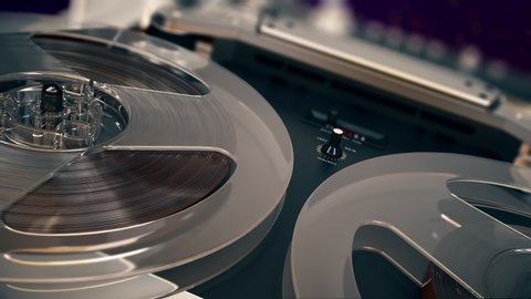 Closeup shot of spinning reels on old analogue reel-to-reel audio tape recorder

Rotation reel with tape. Loopable background for audio or voice listening. 4K UHD ProRes.