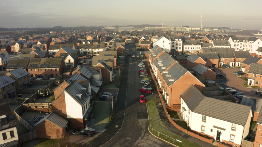 Aerial footage flying down the street of new homes built on the Waverley residential estate in Rotherham, South Yorkshire