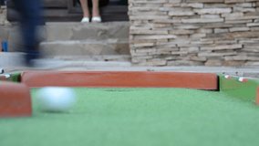 Video of Playing mini golf