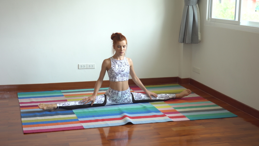 Flexible Gymnast Woman Stretching Forward Bend Touching Forehead To