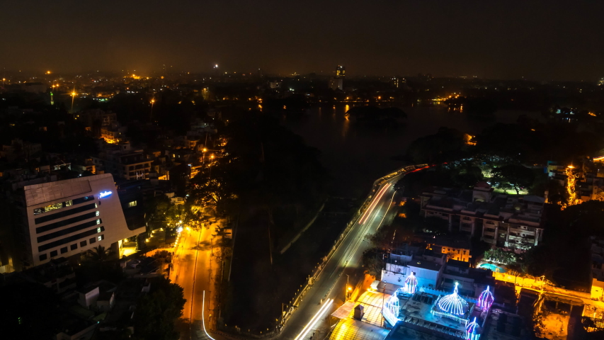 Time Lapse of the Downtown Area of Bangalore at Night Turning into Daytime
