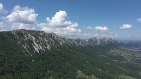 Descending on Veliki Krs mountain by summer morning 4K drone video