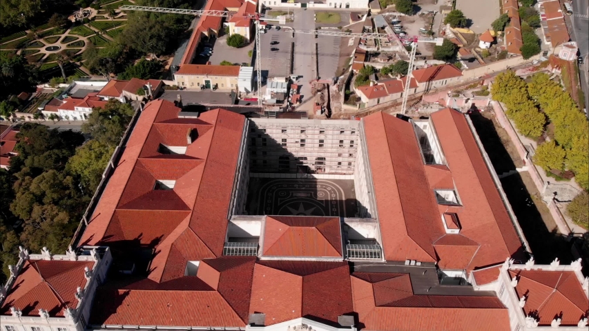 Palácio da Ajuda royal palace in Lisbon aerial drone shot from courtyard view to baroque rococo style facade, Portugal historic touristic attracton