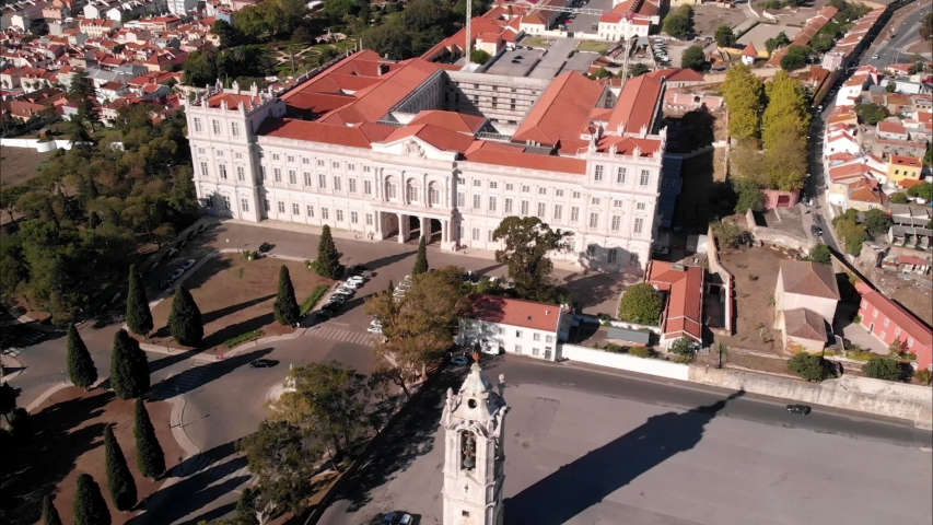 Palácio da Ajuda royal palace and bell tower from aerial parallax view, Portugal historic touristic attracton in Lisbon  