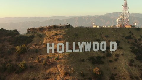 Hollywood, California, USA - Nov 1 2019: Hollywood Sign At Sunset Aerial Shot Rotate Right Fly Away