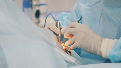 Surgical procedure is being performed on an eye