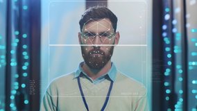 Future. Face ID. High Tech Biometric Facial Recognition. Technological 3D Face Scanning of Bearded IT Administrator with Laptop Working at Data Center Secure Storage. Augmented Reality. - Powered by Shutterstock - Get 15% off with code: PIKWIZARD15