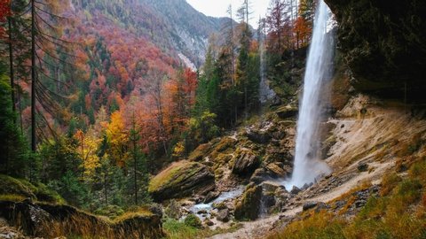  Pericnik waterfall in autumn colors on forest in Triglav National Park, Slovenian Alps in Slovenia,Europe