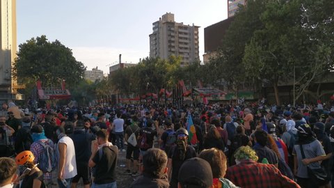 Santiago de Chile
Chile
22 November 2019
People crowds protesting at Santiago de Chile streets in Plaza de Italia during latest Chile protests and general strike after one month of protests