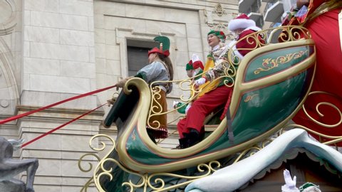 New York City, NY - November 28, 2019: Santa's Sleigh Float and Reindeer w/ Santa, Miss Claus and Elves in the Annual Macy's Thanksgiving Day Parade