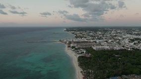 Drone Tracing a Caribbean Beach at Sunrise - 4k Aerial