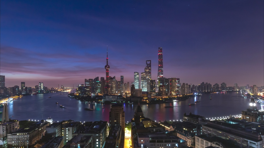 4K Time lapse - Urban skyline and cityscape at sunrise in Shanghai China.