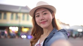 Traveler Asian blogger women travel in Bangkok, Thailand, beautiful female using mobile phone make vlog and live in social media .woman tourist making video call with smartphone while traveling .