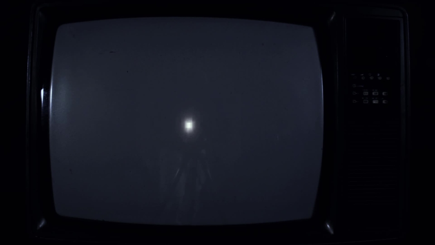 Apollo 11 Take Off on a Retro Television. Close Up. Night Tone. Elements of this Video furnished by NASA.