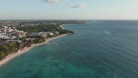 High Flying Above a Beach Resort at Sunrise - 4k Aerial Footage