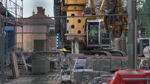Gothenburg , Vastra Gotaland / Sweden - 03 24 2019: Big construction machine working inside of Liseberg amusement park in Gothenburg, Sweden.