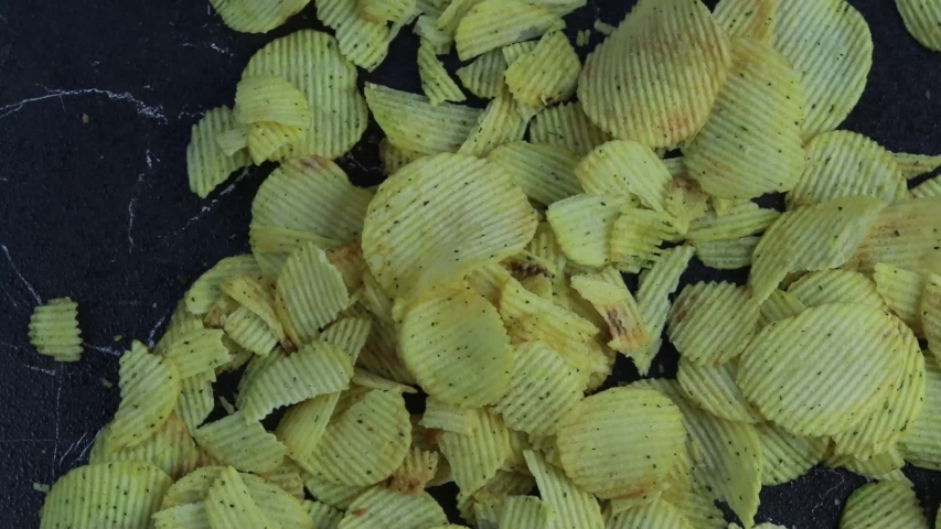 marble floor, served with chips, close-up.