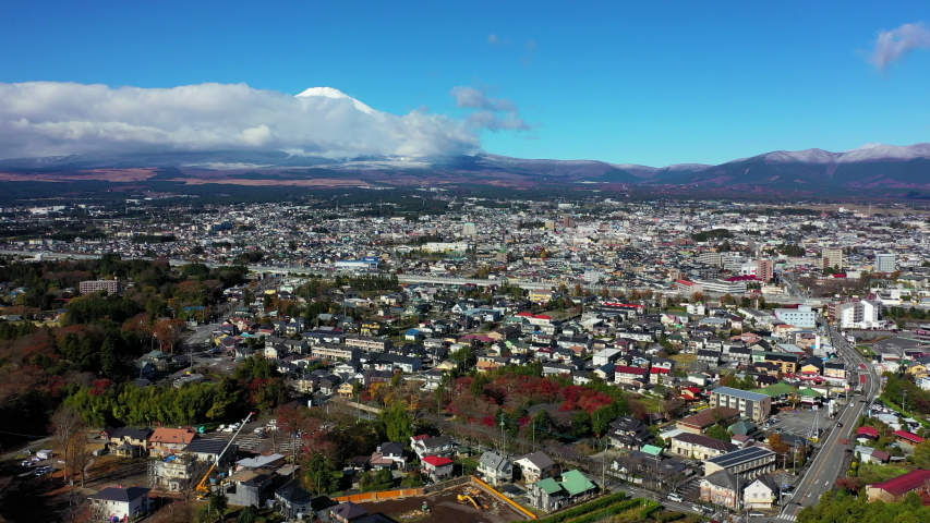 Aerial view of Fuji mountains and Gotemba city over Heiwa koen. | Shutterstock HD Video #1042113442