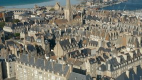 HD Aerial tracking shot of Saint Malo historic town in France on sunny day v3