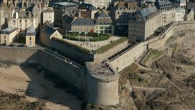 HD Aerial approach toward Saint Malo historic town in France, over walls v2