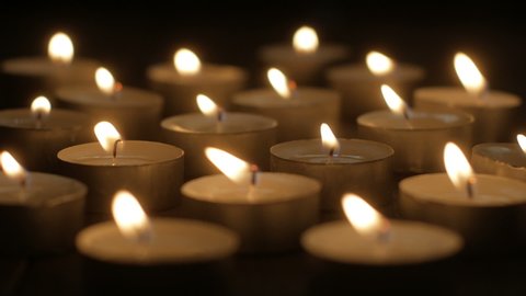 Video of lighting candle in dark
