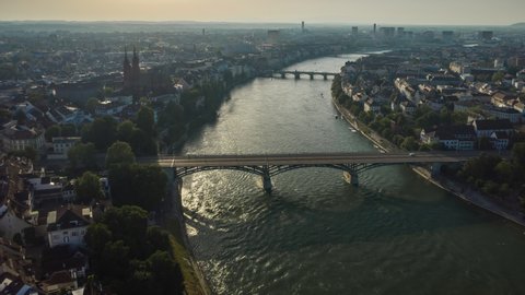 basel city center sunny evening riverside aerial panorama 4k timelapse switzerland