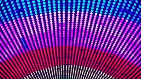 Colored light bulbs change the colors on the screen at a club party. Background.
