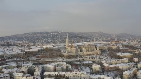 Hungary Budapest. Winter mood aerial city video about the Fishermans bastion (halaszbastya) and Matthias church (Mátyás templom) in the Buda royal castle area. Popular tourist destination attraction.